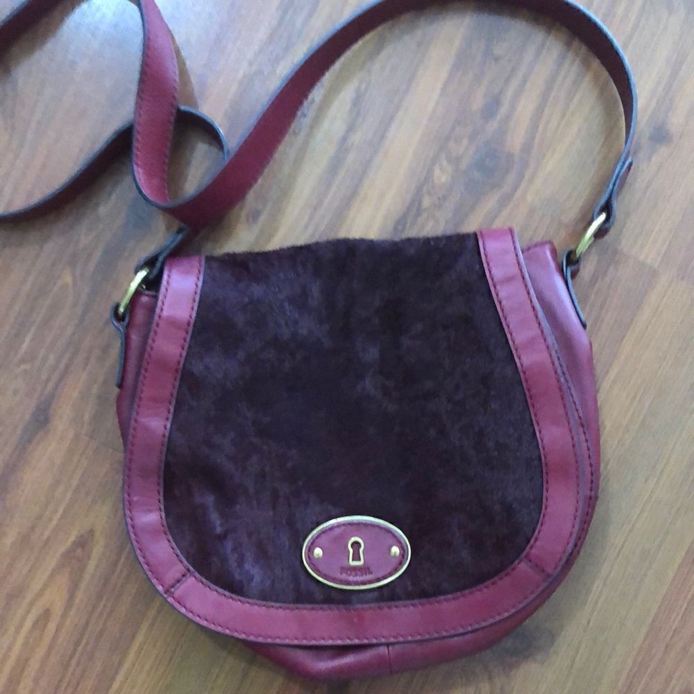 Vintage fossil red burgundy saddle bag with fur.